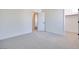 Spacious bedroom with neutral carpeting and ample closet space at 11935 Glide Reflection Ave, Las Vegas, NV 89138