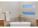 Bathroom with free standing tub and gold fixtures at 1343 Panini Dr, Henderson, NV 89052