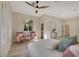 Relaxing bedroom with hardwood floors and sitting area at 1343 Panini Dr, Henderson, NV 89052