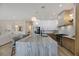 Modern kitchen with two-toned cabinetry, marble island, and stainless steel appliances at 1343 Panini Dr, Henderson, NV 89052