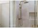 Modern shower with gold fixtures and large format tile at 1343 Panini Dr, Henderson, NV 89052