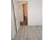 Clean bathroom with wood-look floors and toilet at 1732 Monte Alban Dr, North Las Vegas, NV 89031