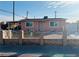 Updated single story home with a fenced front yard at 1972 H St, Las Vegas, NV 89106