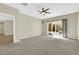 Spacious bedroom with carpet flooring and sliding glass door at 2067 Bliss Corner St, Henderson, NV 89044