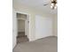 Spacious bedroom with double doors leading to an ensuite bathroom at 2067 Bliss Corner St, Henderson, NV 89044