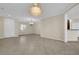 Elegant dining room with tile floors and two chandeliers at 2067 Bliss Corner St, Henderson, NV 89044