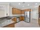 Spacious kitchen featuring granite countertops and stainless steel appliances at 2067 Bliss Corner St, Henderson, NV 89044