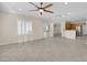 Spacious living room, tile floors, and views into kitchen area at 2067 Bliss Corner St, Henderson, NV 89044