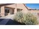 Landscaped backyard with walkway and plants at 2221 E Winery Rd, Pahrump, NV 89048