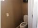 Small bathroom with toilet and single sink at 2221 E Winery Rd, Pahrump, NV 89048