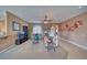 Living room with tiled floors, fireplace, and neutral decor at 2221 E Winery Rd, Pahrump, NV 89048