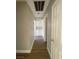 Hallway with wood-look floors and built-in storage at 2410 Poplar Ave, Las Vegas, NV 89101