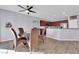 Dining area with a round table, four chairs, and hardwood floors at 2525 Shore Bird Ave, North Las Vegas, NV 89084