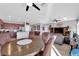 Open dining area with a wooden table and chairs, adjacent to the kitchen at 2525 Shore Bird Ave, North Las Vegas, NV 89084