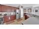 Modern kitchen with stainless steel appliances and wood cabinets at 2525 Shore Bird Ave, North Las Vegas, NV 89084