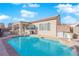 Private pool and patio area with seating and a grill at 2525 Shore Bird Ave, North Las Vegas, NV 89084