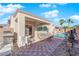 Private backyard oasis with a sparkling pool and patio furniture at 2525 Shore Bird Ave, North Las Vegas, NV 89084