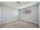 Spacious bedroom with neutral walls and carpet flooring at 2620 Shiloh Way, North Las Vegas, NV 89030