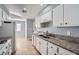 Kitchen with white cabinets and granite countertops at 2620 Shiloh Way, North Las Vegas, NV 89030