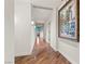 Long hallway with hardwood floors and neutral walls at 2777 Paradise Rd # 3701, Las Vegas, NV 89109