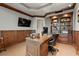 Bright home office features a large desk and built-in shelving at 2777 Paradise Rd # 3701, Las Vegas, NV 89109