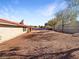 Large backyard with gravel and covered patio area at 311 E Desert Rose Dr, Henderson, NV 89015