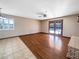 Open dining area with hardwood floors and access to backyard at 311 E Desert Rose Dr, Henderson, NV 89015