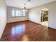 Spacious dining area with hardwood floors and kitchen views at 311 E Desert Rose Dr, Henderson, NV 89015