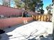 Spacious backyard with tall trees and a concrete patio perfect for outdoor gatherings at 3155 Mountain Spring Rd, Las Vegas, NV 89146