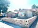 Charming single-story home featuring unique stonework and a well-maintained front yard at 3155 Mountain Spring Rd, Las Vegas, NV 89146