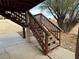 Exterior back stairs leading to a patio area at 3160 James A Bilbray Pkwy, Laughlin, NV 89029