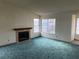 Living room with fireplace and carpet at 3160 James A Bilbray Pkwy, Laughlin, NV 89029