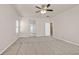 Spacious bedroom with ceiling fan and carpet flooring at 33 Gentilly Lace Ave, Henderson, NV 89002