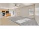 Spacious living room with grey carpet and ceiling fan at 33 Gentilly Lace Ave, Henderson, NV 89002