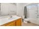 Bright bathroom with a bathtub and a vanity sink at 3517 Colby Creek Ave, North Las Vegas, NV 89081