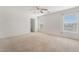 Bedroom with carpet flooring, ceiling fan and windows for great natural light at 3517 Colby Creek Ave, North Las Vegas, NV 89081