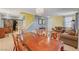 Elegant dining room with a wood table and access to kitchen at 3517 Colby Creek Ave, North Las Vegas, NV 89081