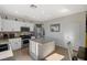 Modern kitchen with stainless steel appliances and an island at 3517 Colby Creek Ave, North Las Vegas, NV 89081