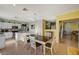 Kitchen with island, stainless steel appliances, and white cabinets at 3517 Colby Creek Ave, North Las Vegas, NV 89081