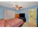 Bright laundry room with washer, dryer, and shelving at 3517 Colby Creek Ave, North Las Vegas, NV 89081