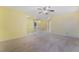 Loft with carpeted floors, access to rooms, and a staircase leading down at 3517 Colby Creek Ave, North Las Vegas, NV 89081