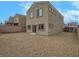 Large gravel backyard of a two-story house at 372 Monique Springs St, Henderson, NV 89014