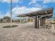 Community park with shaded picnic tables and playground at 372 Monique Springs St, Henderson, NV 89014