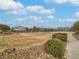 Community green space with walking path and residential homes at 372 Monique Springs St, Henderson, NV 89014