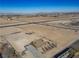 Aerial view showcasing home's setting and surrounding desert landscape at 3900 W Landberg Ave, Las Vegas, NV 89141