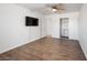 Well-lit bedroom with wood-look floors and closet at 3939 Springhill Ave, Las Vegas, NV 89121