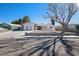 Single story home with front yard landscaping and driveway at 3939 Springhill Ave, Las Vegas, NV 89121