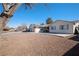 House exterior showcasing a side view and landscaping at 3939 Springhill Ave, Las Vegas, NV 89121