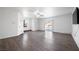 Bright living room featuring wood-look floors and a ceiling fan at 3939 Springhill Ave, Las Vegas, NV 89121