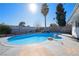 Relaxing kidney-shaped pool with rock waterfall feature at 3939 Springhill Ave, Las Vegas, NV 89121